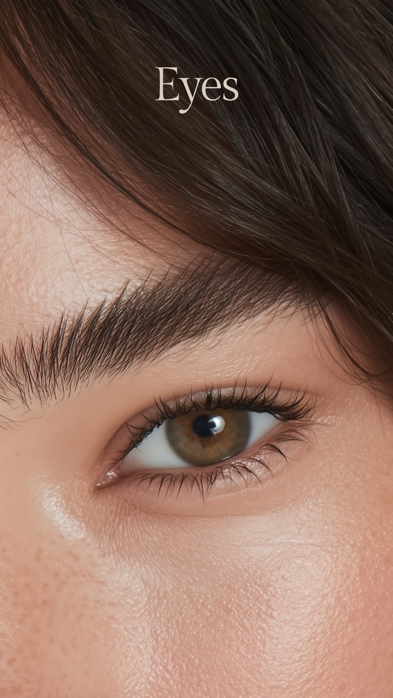 Close-up of a brown eye with the word 'Eyes' above it.