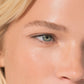 Close-up of a person's eye with blonde hair and blue eyes (Light brown)