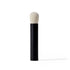 Makeup brush with black handle and white bristle head on a white background