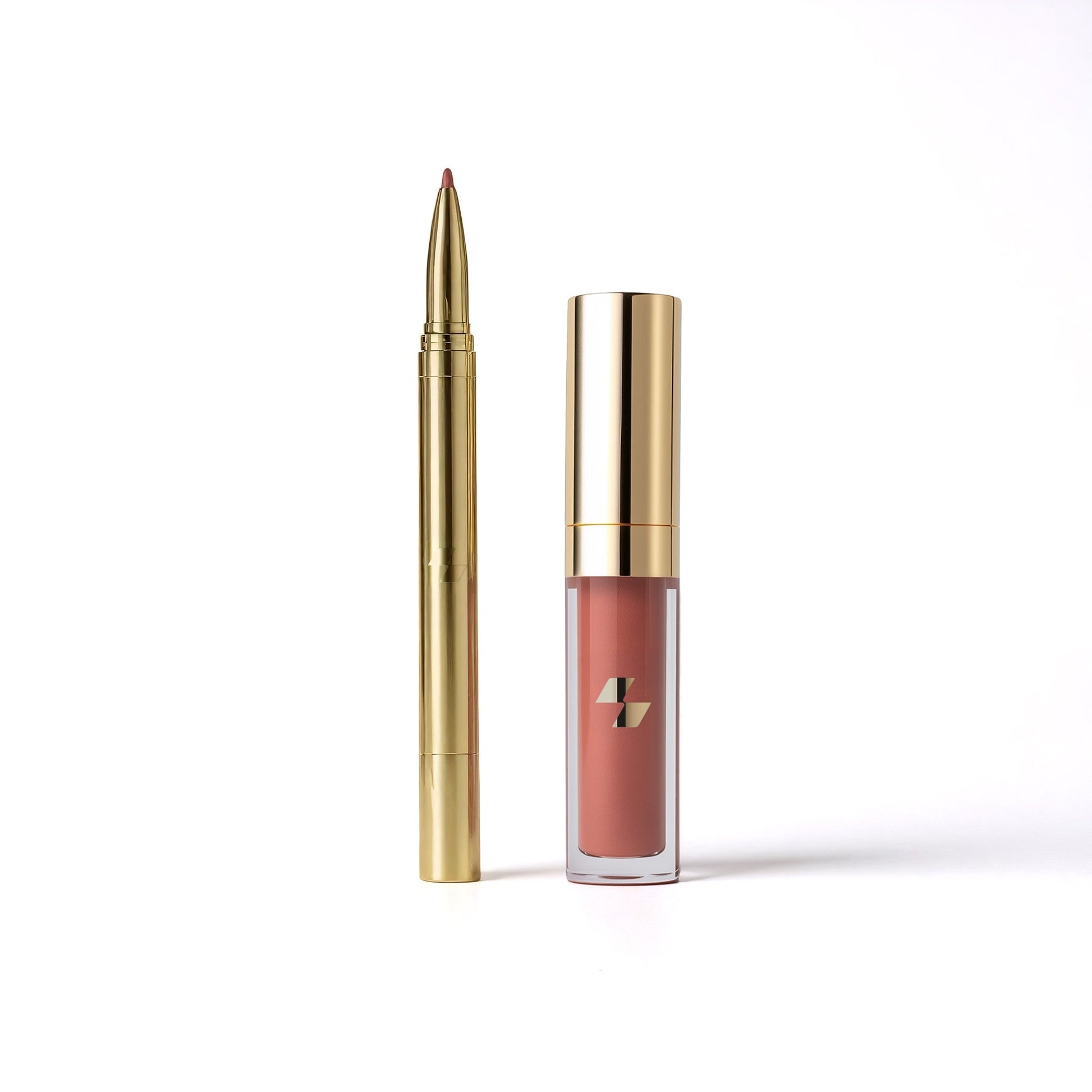 Lipstick with gold casing on a white background