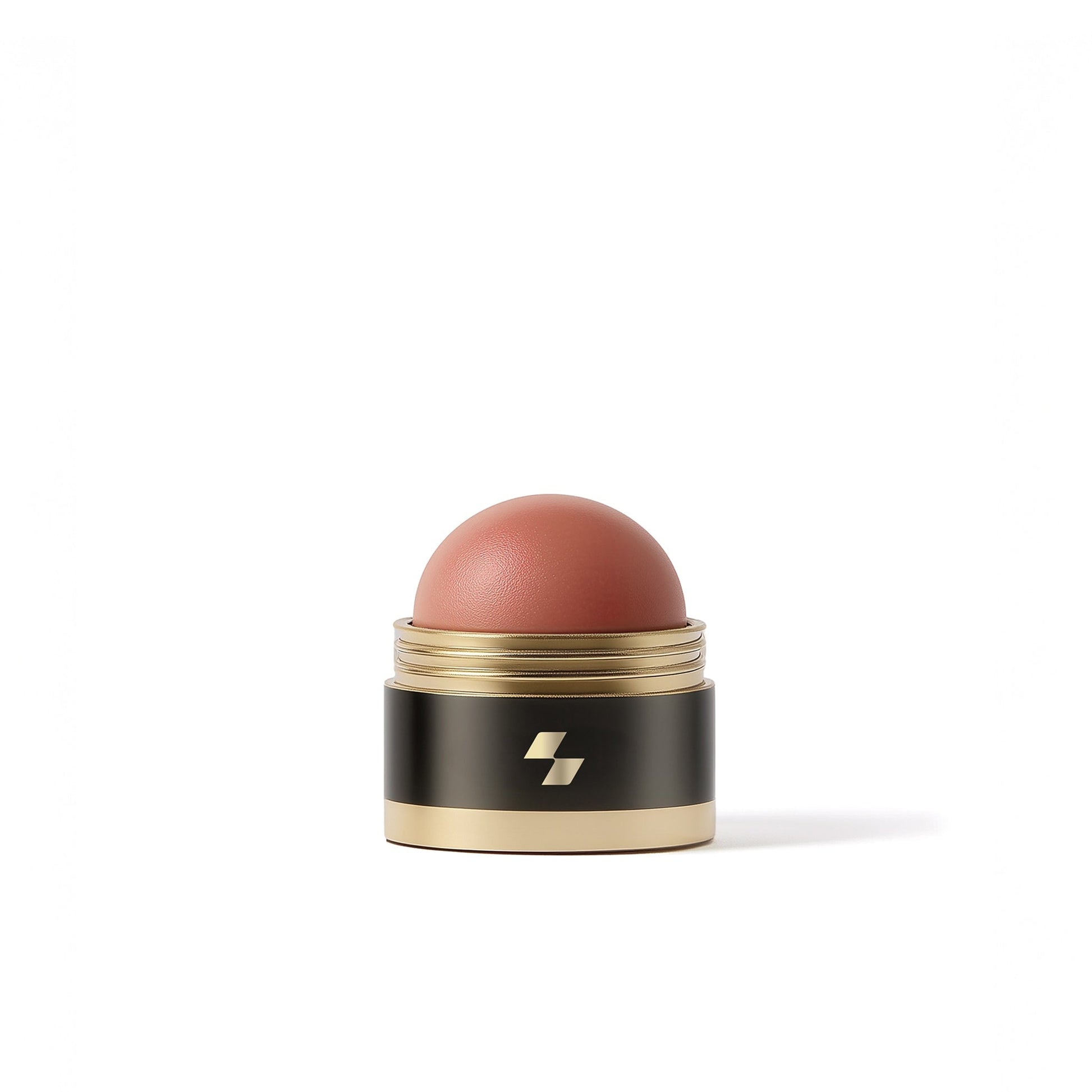 Cosmetic blush stick with black and gold packaging on a white background