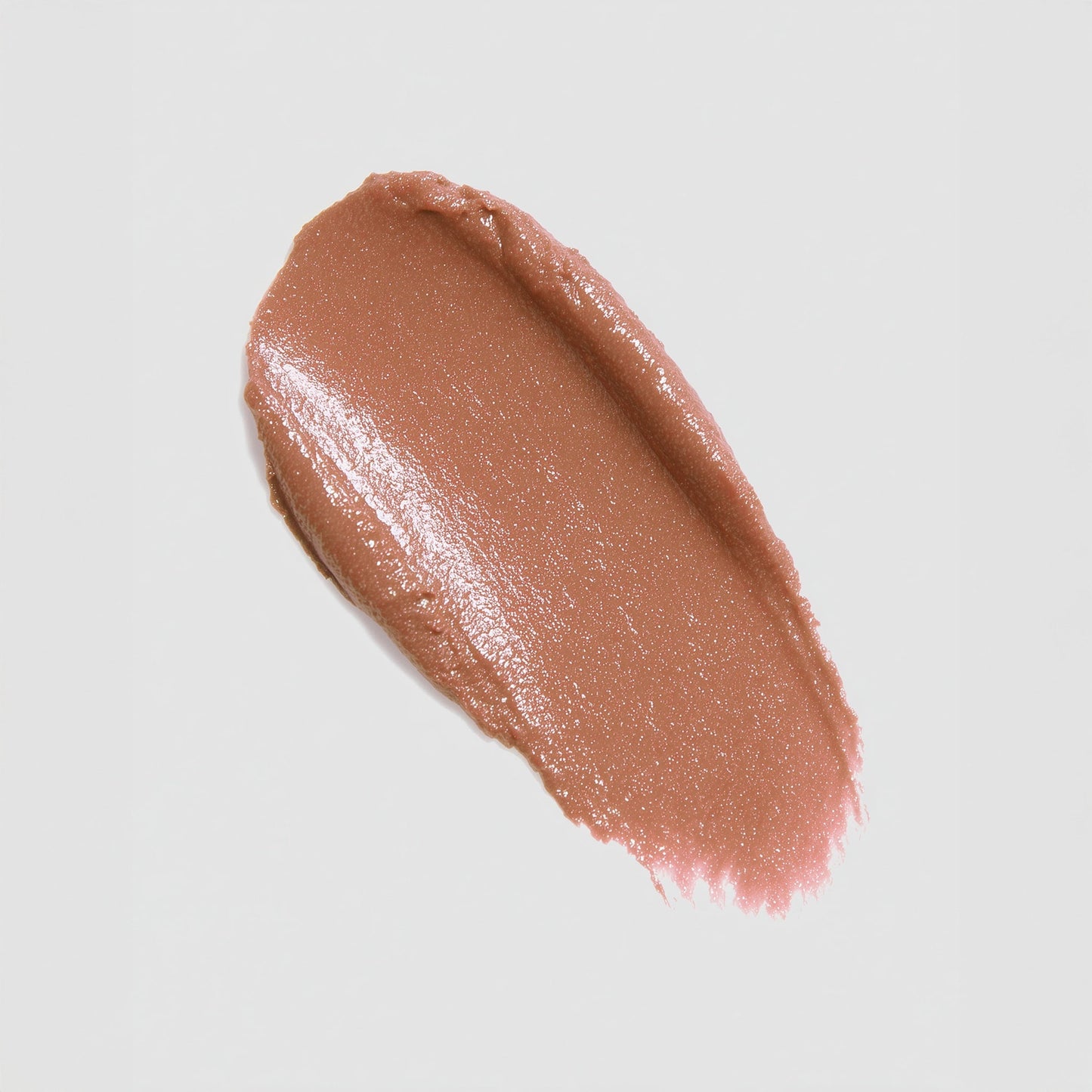 Nude-colored makeup swatch on a light gray background (Beige)