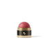 Pink makeup stick with gold and black packaging on a white background (Red)