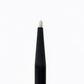 Black makeup brush with white bristle tip on a white background