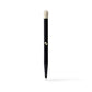 Black makeup brush with a white bristle tip on a white background