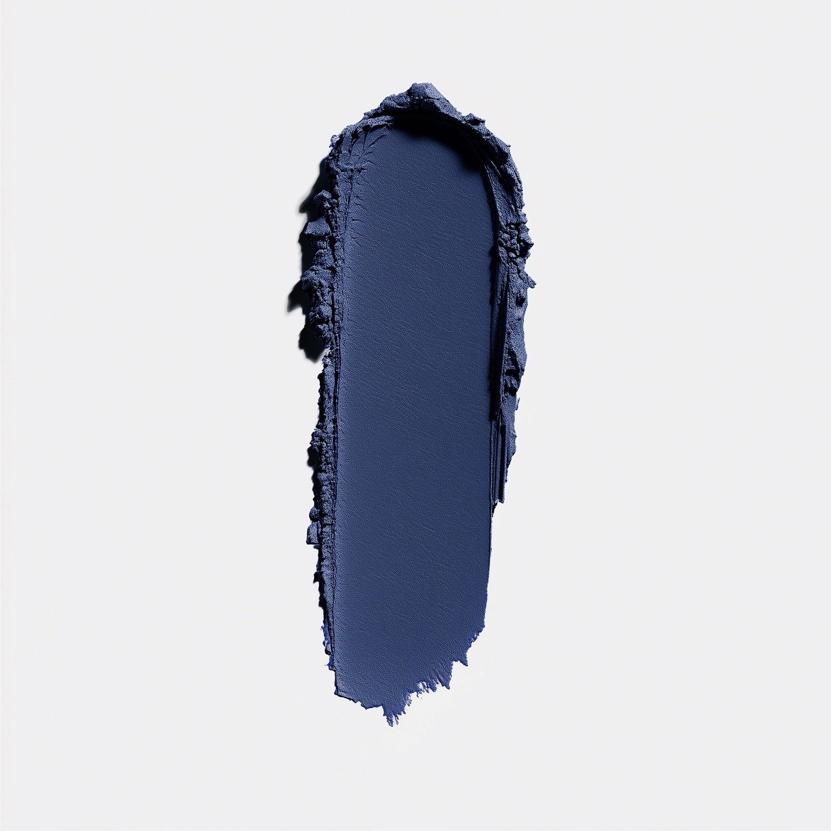 Navy blue makeup swatch on a light gray background (Blue)