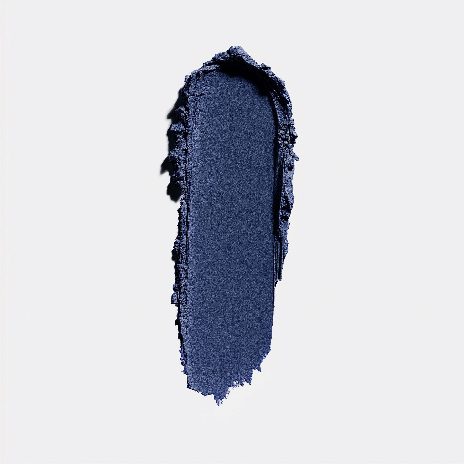 Navy blue makeup swatch on a light gray background (Blue)