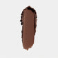 Brown makeup swatch on a light gray background (Brown)