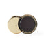 Cosmetic compact with gold lid and black interior on a white background (Violet)