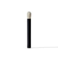 Makeup brush with black handle and white bristle head on a white background