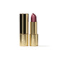 Gold lipstick with a purple shade on a white background (Vine)