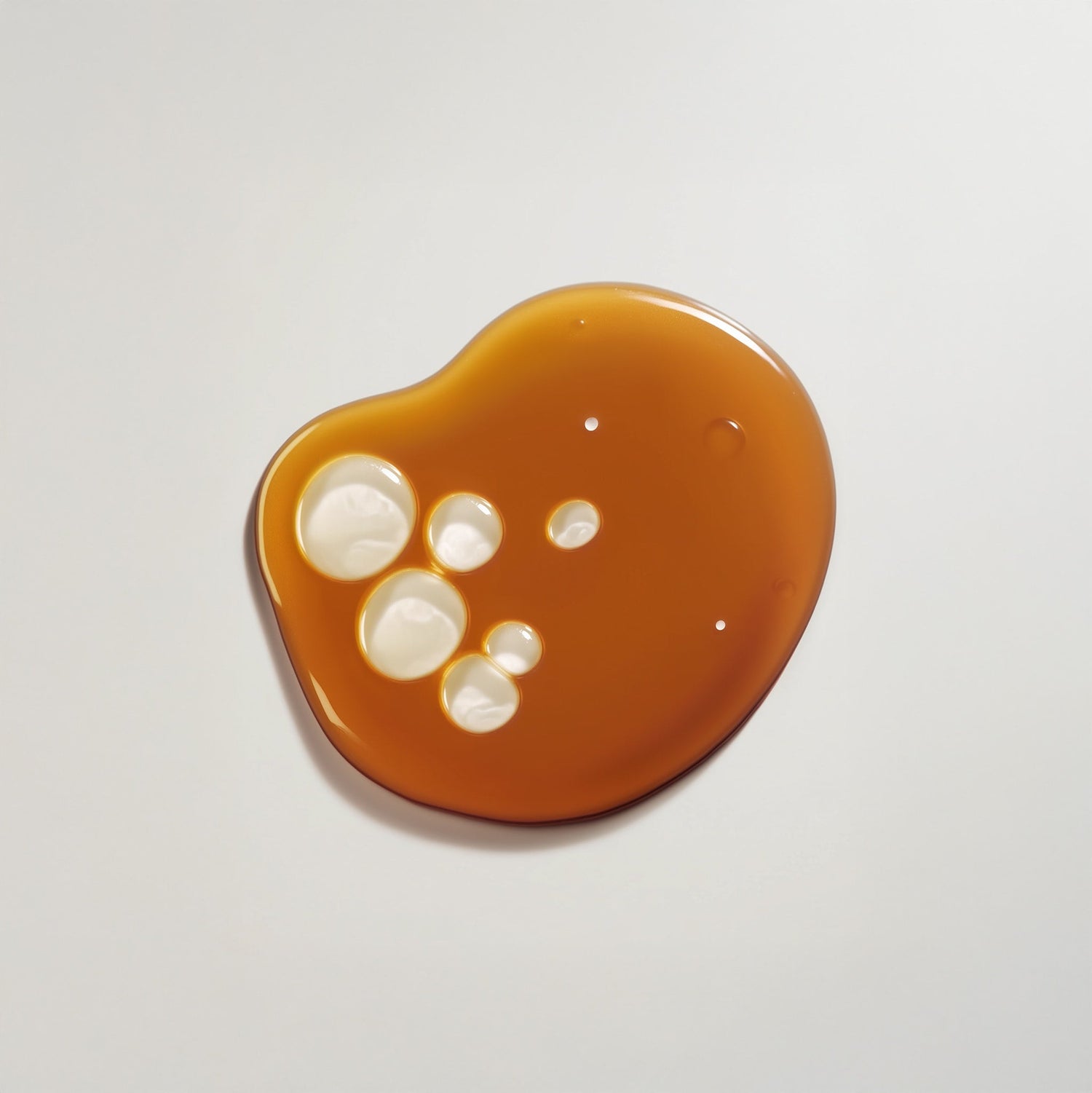 Brown stone with white spots on a light gray background
